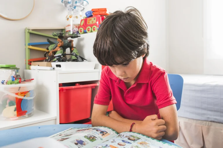 Child Reading Book Table 770x514